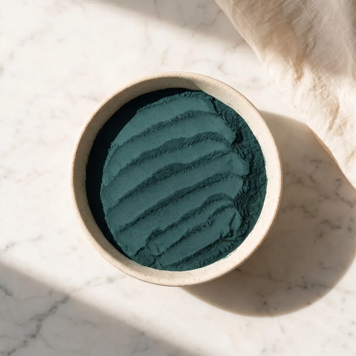 Spirulina powder in a bowl — the single ingredient