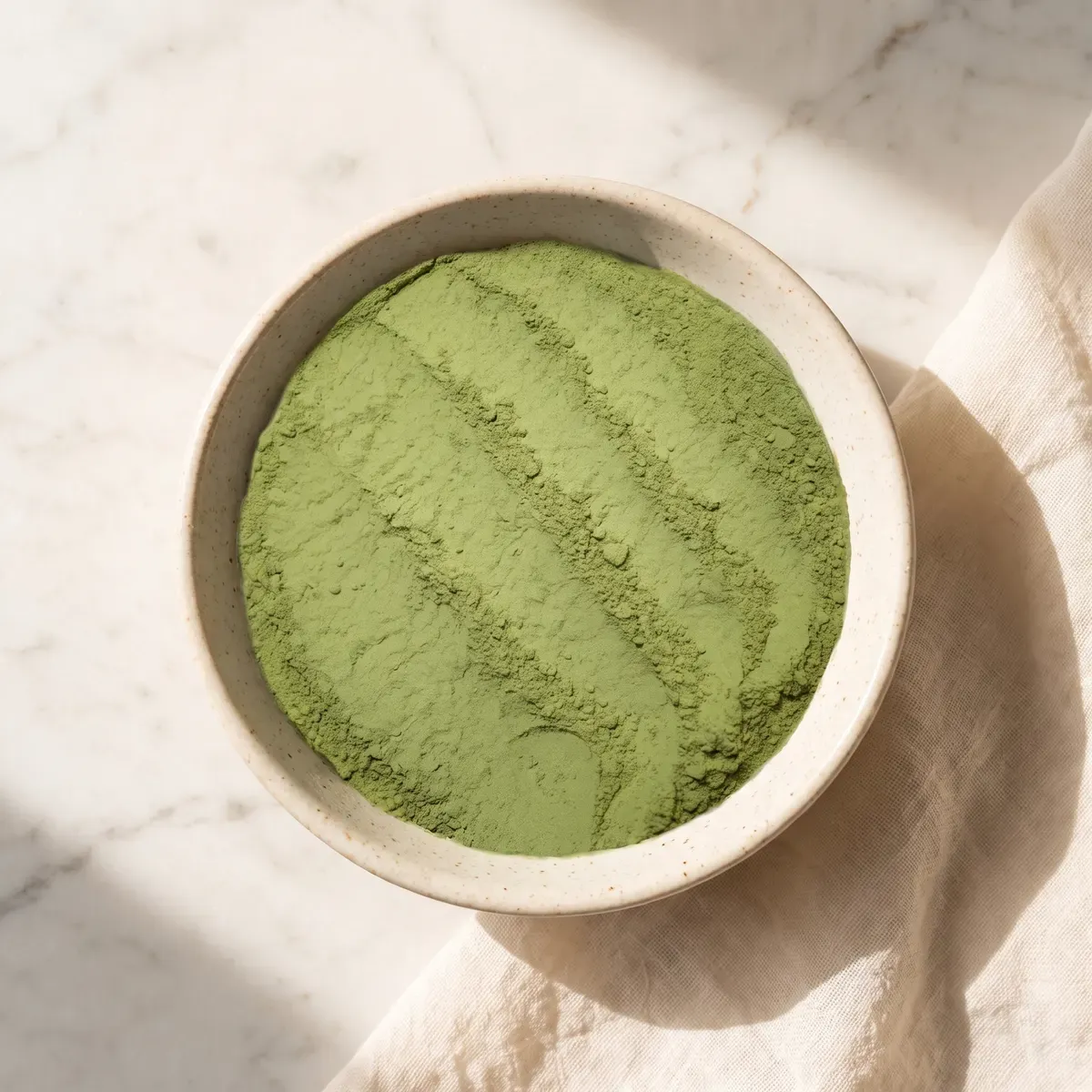 Wheatgrass powder in a bowl — the single ingredient